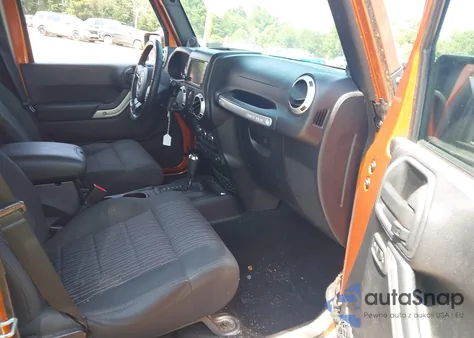 2011 Jeep Wrangler Unlimited Sahara из США, поврежденный, VIN 1J4BA5H15BL588327